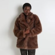 Manteau imitation fourrure